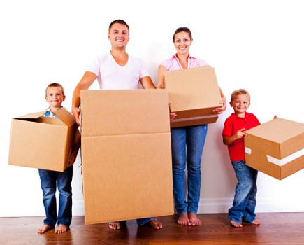 Loading furniture into a removals van near Chelsea homes