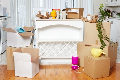 Packed office items ready for loading during a Chelsea move