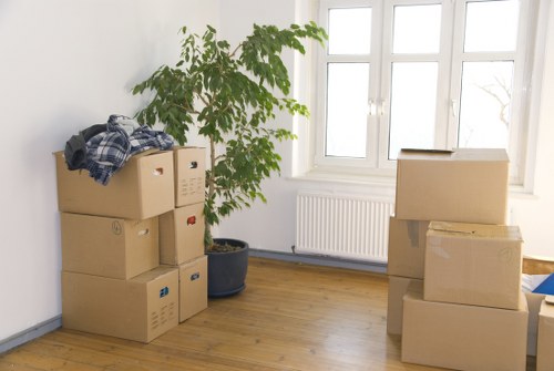 Packed household boxes prepared for a Chelsea home relocation