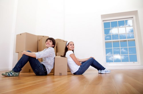 Professional movers supporting a flat relocation in Chelsea with careful packing