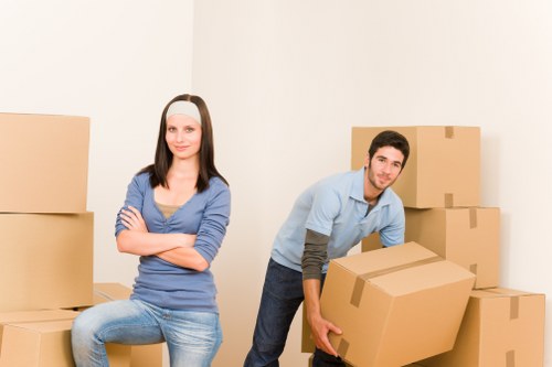 Loading office furniture and equipment for a Chelsea removals service