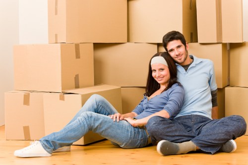 Packed boxes and furniture ready for flat removals in a Chelsea apartment