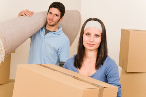 Loading furniture into a van for a Chelsea property move