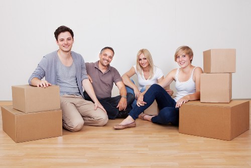 Local furniture removal team handling a sofa and table pickup in Chelsea